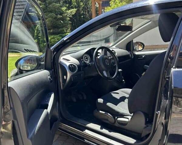 Чорний Мазда 2, об'ємом двигуна 1.5 л та пробігом 196 тис. км за 5977 $, фото 4 на Automoto.ua