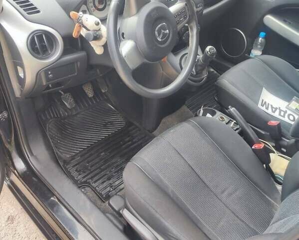 Черный Мазда 2, объемом двигателя 1.4 л и пробегом 195 тыс. км за 4900 $, фото 4 на Automoto.ua