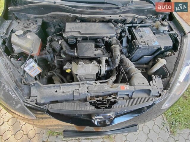 Чорний Мазда 2, об'ємом двигуна 1.4 л та пробігом 300 тис. км за 3700 $, фото 5 на Automoto.ua