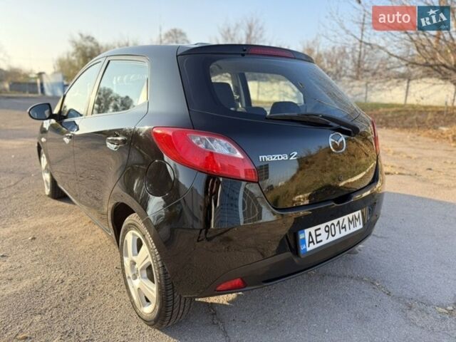 Чорний Мазда 2, об'ємом двигуна 1.4 л та пробігом 186 тис. км за 4999 $, фото 3 на Automoto.ua