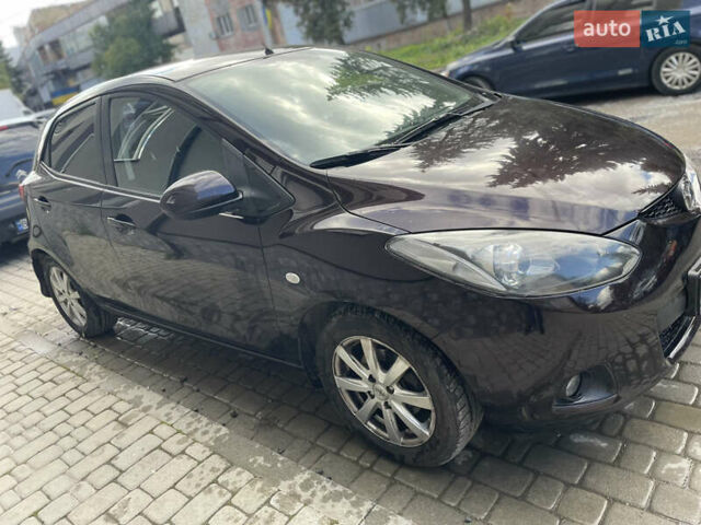 Черный Мазда 2, объемом двигателя 1.5 л и пробегом 145 тыс. км за 5750 $, фото 6 на Automoto.ua