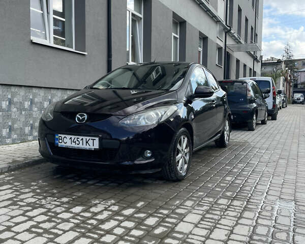 Черный Мазда 2, объемом двигателя 1.5 л и пробегом 145 тыс. км за 5750 $, фото 2 на Automoto.ua
