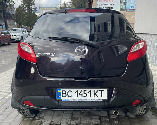 Черный Мазда 2, объемом двигателя 1.5 л и пробегом 145 тыс. км за 5750 $, фото 5 на Automoto.ua