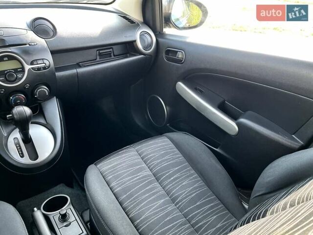 Чорний Мазда 2, об'ємом двигуна 1.5 л та пробігом 231 тис. км за 7250 $, фото 28 на Automoto.ua