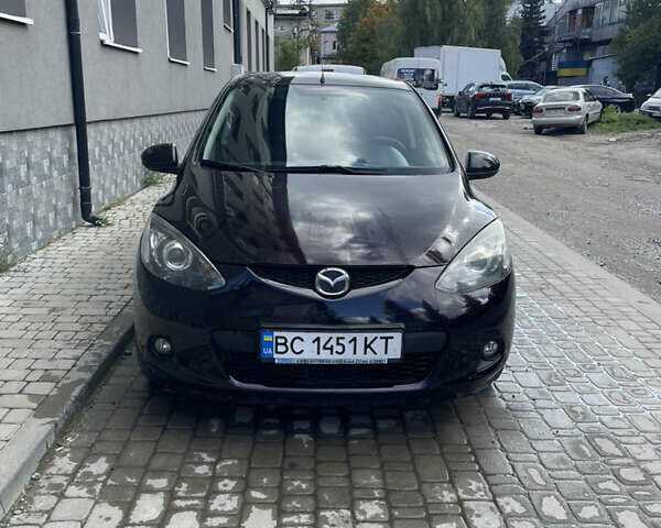 Черный Мазда 2, объемом двигателя 1.5 л и пробегом 145 тыс. км за 5750 $, фото 1 на Automoto.ua