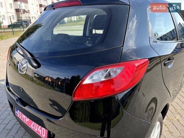 Мазда 2 2009 в Славуте на Automoto.ua Черный Мазда 2, объемом двигателя 1.5 л и пробегом 231 тыс. км за 7450 $, фото 20 на Automoto.ua