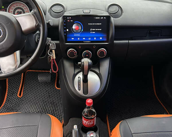 Чорний Мазда 2, об'ємом двигуна 1.5 л та пробігом 160 тис. км за 7000 $, фото 7 на Automoto.ua