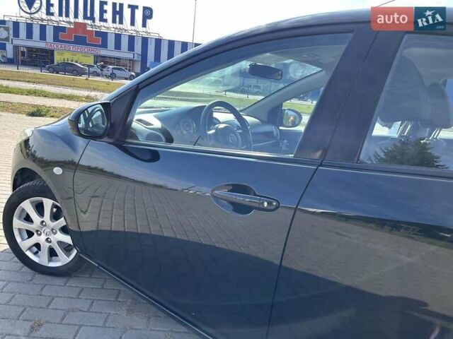 Чорний Мазда 2, об'ємом двигуна 1.5 л та пробігом 231 тис. км за 7250 $, фото 12 на Automoto.ua