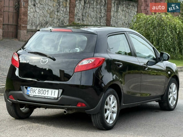 Чорний Мазда 2, об'ємом двигуна 1.35 л та пробігом 197 тис. км за 4997 $, фото 1 на Automoto.ua