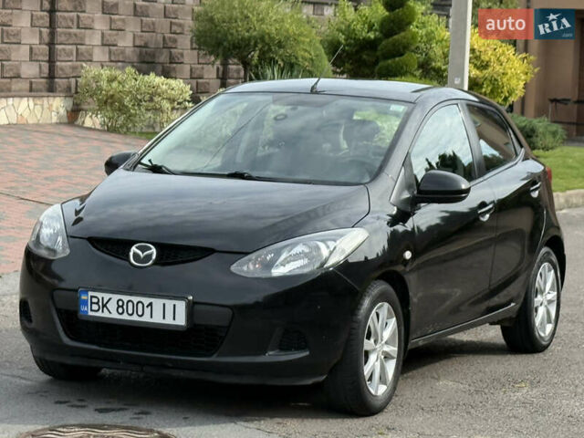 Чорний Мазда 2, об'ємом двигуна 1.35 л та пробігом 197 тис. км за 4997 $, фото 3 на Automoto.ua