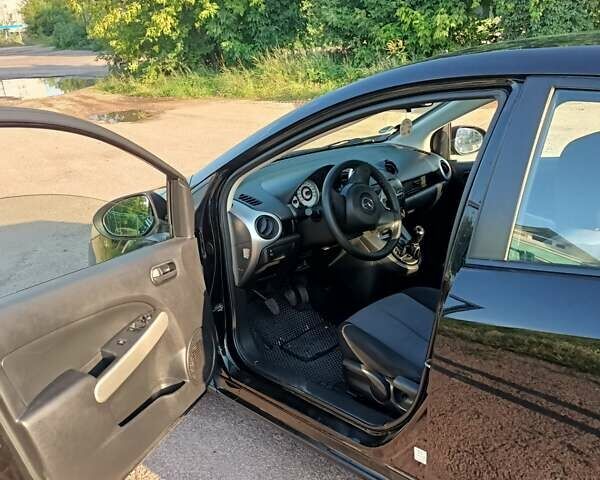 Чорний Мазда 2, об'ємом двигуна 1.3 л та пробігом 124 тис. км за 4300 $, фото 2 на Automoto.ua