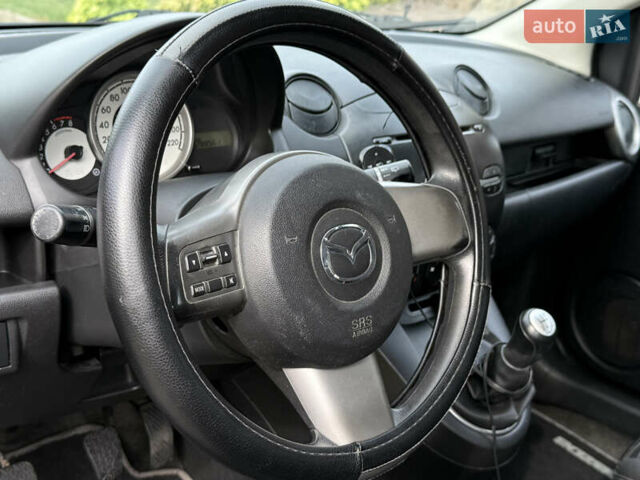Чорний Мазда 2, об'ємом двигуна 1.35 л та пробігом 197 тис. км за 4997 $, фото 14 на Automoto.ua