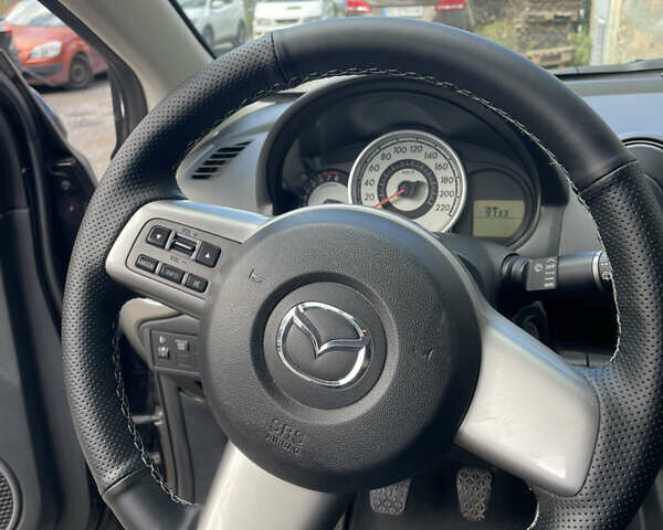 Чорний Мазда 2, об'ємом двигуна 1.5 л та пробігом 146 тис. км за 5000 $, фото 26 на Automoto.ua