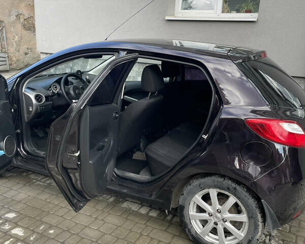 Черный Мазда 2, объемом двигателя 1.5 л и пробегом 145 тыс. км за 5750 $, фото 11 на Automoto.ua