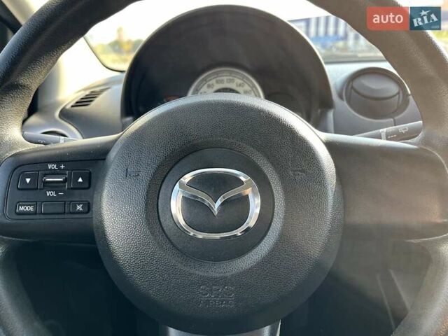 Мазда 2 2009 в Славуте на Automoto.ua Черный Мазда 2, объемом двигателя 1.5 л и пробегом 231 тыс. км за 7450 $, фото 32 на Automoto.ua