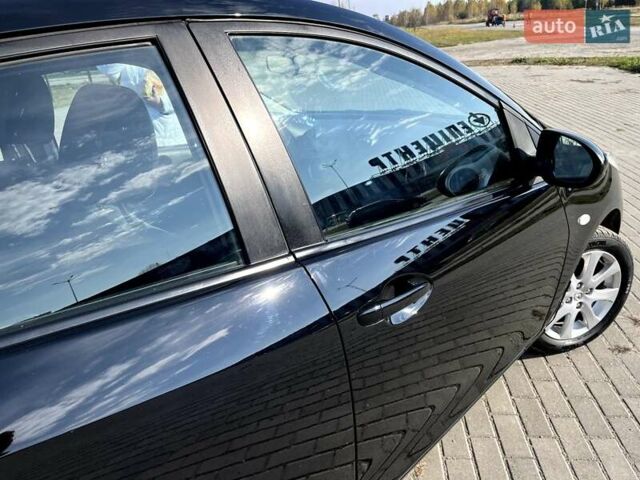 Чорний Мазда 2, об'ємом двигуна 1.5 л та пробігом 231 тис. км за 7250 $, фото 13 на Automoto.ua