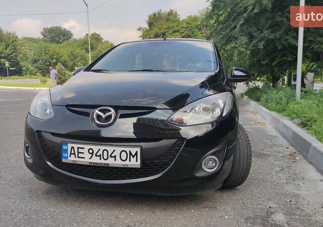 Чорний Мазда 2, об'ємом двигуна 1.3 л та пробігом 178 тис. км за 6000 $, фото 3 на Automoto.ua
