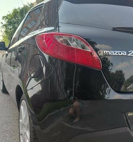 Чорний Мазда 2, об'ємом двигуна 1.3 л та пробігом 178 тис. км за 6000 $, фото 13 на Automoto.ua