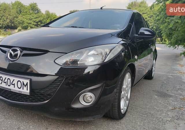 Чорний Мазда 2, об'ємом двигуна 1.3 л та пробігом 178 тис. км за 6000 $, фото 9 на Automoto.ua