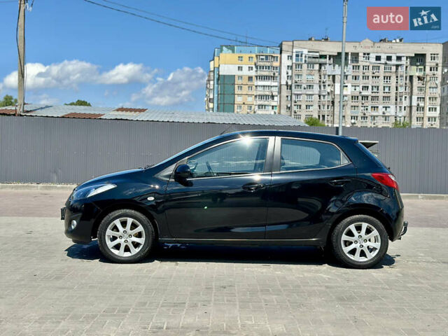 Черный Мазда 2, объемом двигателя 1.35 л и пробегом 220 тыс. км за 6333 $, фото 7 на Automoto.ua