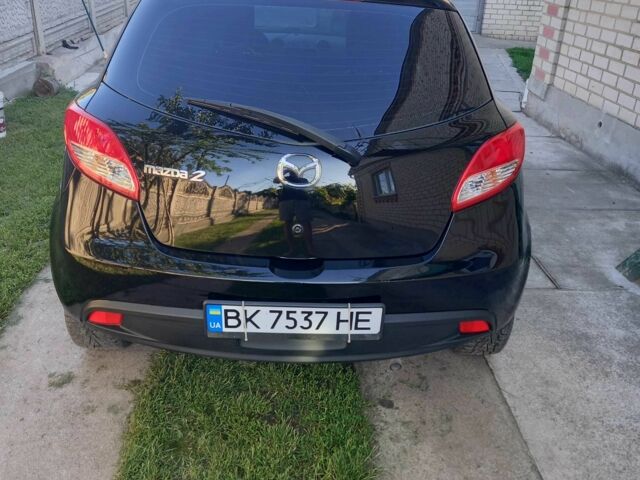 Черный Мазда 2, объемом двигателя 1.5 л и пробегом 200 тыс. км за 5000 $, фото 3 на Automoto.ua