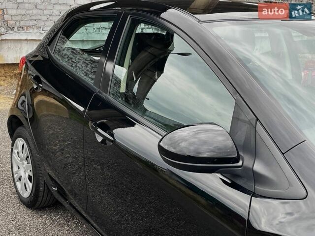 Чорний Мазда 2, об'ємом двигуна 1.5 л та пробігом 83 тис. км за 7699 $, фото 12 на Automoto.ua