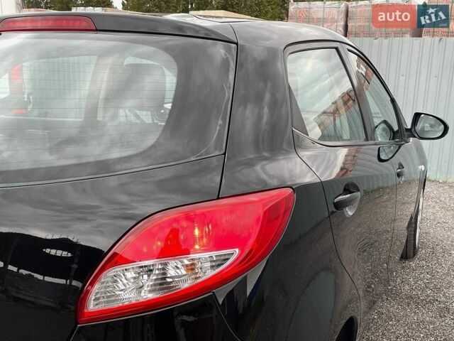 Чорний Мазда 2, об'ємом двигуна 1.5 л та пробігом 83 тис. км за 7699 $, фото 24 на Automoto.ua
