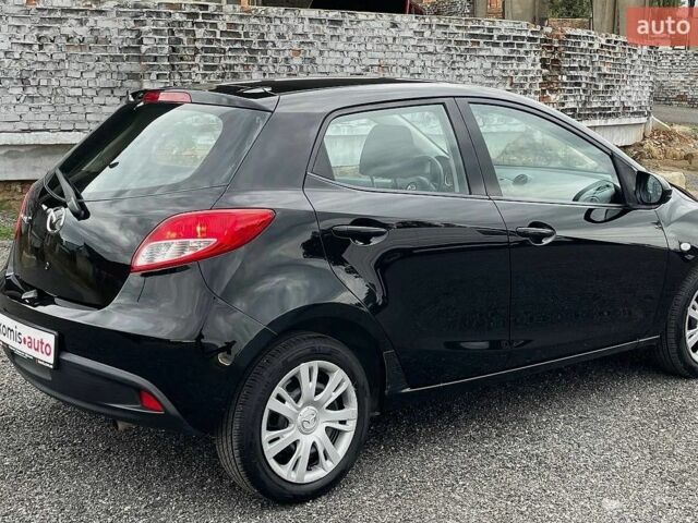 Чорний Мазда 2, об'ємом двигуна 1.5 л та пробігом 83 тис. км за 7699 $, фото 19 на Automoto.ua