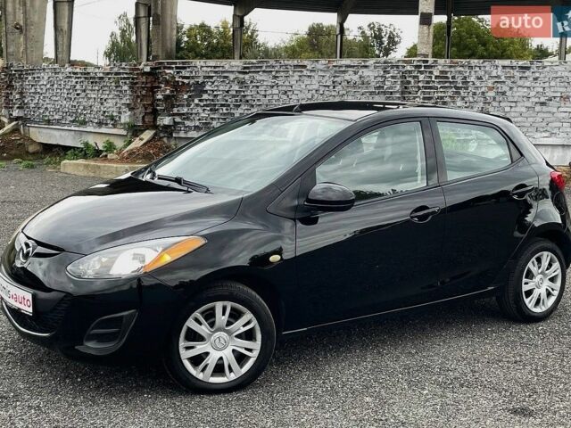 Чорний Мазда 2, об'ємом двигуна 1.5 л та пробігом 83 тис. км за 7699 $, фото 4 на Automoto.ua