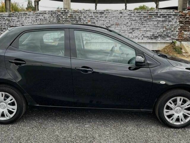 Черный Мазда 2, объемом двигателя 1.5 л и пробегом 83 тыс. км за 7728 $, фото 3 на Automoto.ua