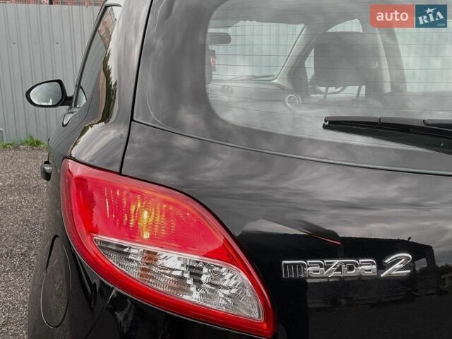 Чорний Мазда 2, об'ємом двигуна 1.5 л та пробігом 83 тис. км за 7699 $, фото 23 на Automoto.ua