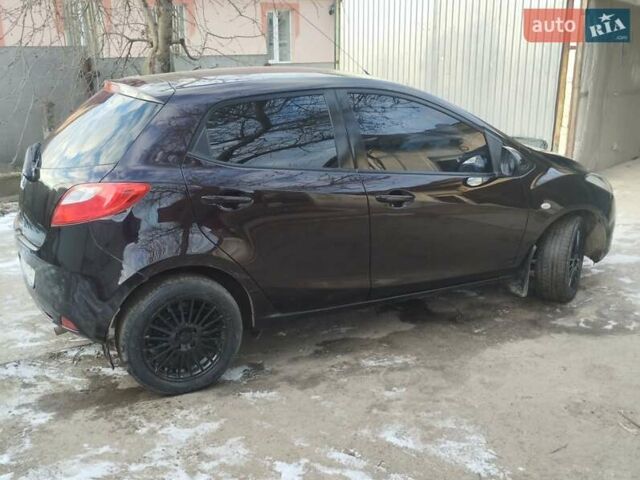 Фіолетовий Мазда 2, об'ємом двигуна 1.5 л та пробігом 158 тис. км за 4400 $, фото 5 на Automoto.ua