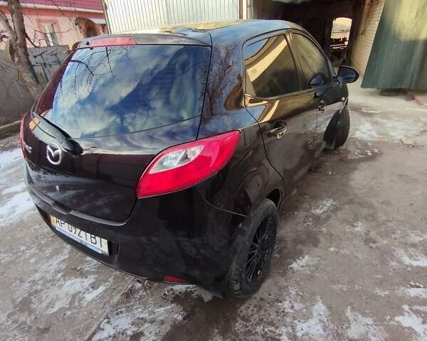 Фіолетовий Мазда 2, об'ємом двигуна 1.5 л та пробігом 158 тис. км за 4400 $, фото 7 на Automoto.ua