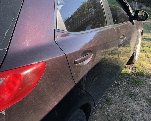 Фиолетовый Мазда 2, объемом двигателя 1.5 л и пробегом 120 тыс. км за 6000 $, фото 2 на Automoto.ua
