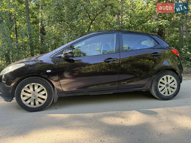Коричневий Мазда 2, об'ємом двигуна 1.4 л та пробігом 249 тис. км за 5200 $, фото 3 на Automoto.ua
