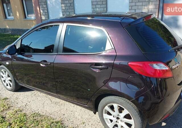 Коричневий Мазда 2, об'ємом двигуна 1.5 л та пробігом 126 тис. км за 6700 $, фото 4 на Automoto.ua