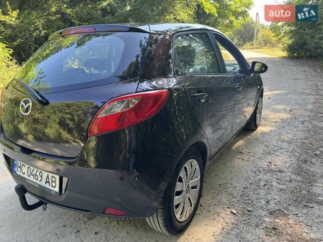 Коричневий Мазда 2, об'ємом двигуна 1.4 л та пробігом 249 тис. км за 5200 $, фото 5 на Automoto.ua