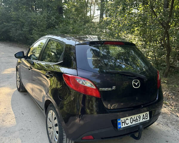 Коричневий Мазда 2, об'ємом двигуна 1.4 л та пробігом 249 тис. км за 5200 $, фото 9 на Automoto.ua