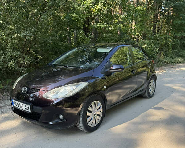 Коричневий Мазда 2, об'ємом двигуна 1.4 л та пробігом 249 тис. км за 5200 $, фото 1 на Automoto.ua