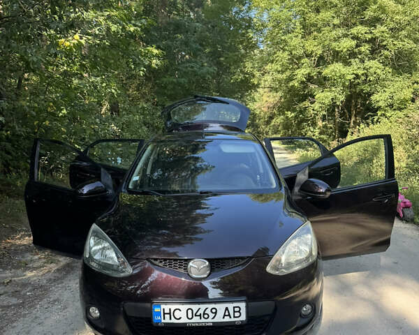 Коричневий Мазда 2, об'ємом двигуна 1.4 л та пробігом 249 тис. км за 5200 $, фото 6 на Automoto.ua