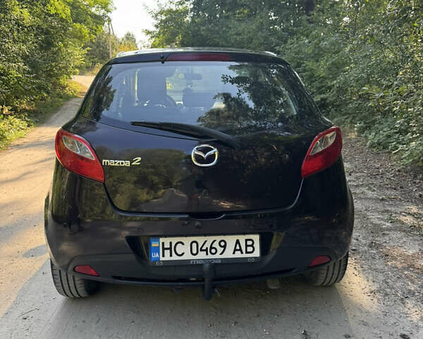 Коричневий Мазда 2, об'ємом двигуна 1.4 л та пробігом 249 тис. км за 5200 $, фото 4 на Automoto.ua