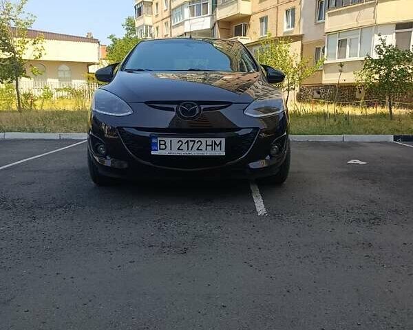 Коричневый Мазда 2, объемом двигателя 1.5 л и пробегом 188 тыс. км за 7950 $, фото 1 на Automoto.ua