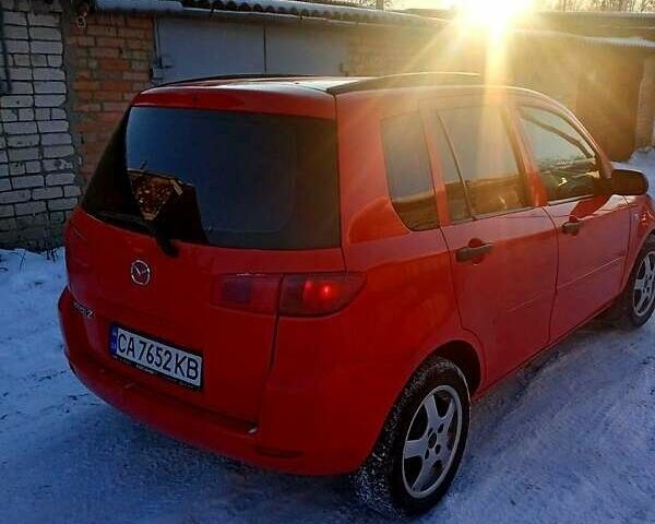 Красный Мазда 2, объемом двигателя 1.2 л и пробегом 160 тыс. км за 4000 $, фото 1 на Automoto.ua