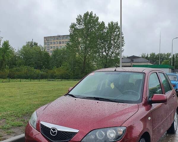 Червоний Мазда 2, об'ємом двигуна 1.4 л та пробігом 170 тис. км за 4200 $, фото 6 на Automoto.ua