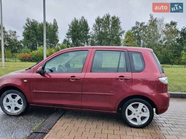 Червоний Мазда 2, об'ємом двигуна 1.4 л та пробігом 170 тис. км за 4200 $, фото 5 на Automoto.ua