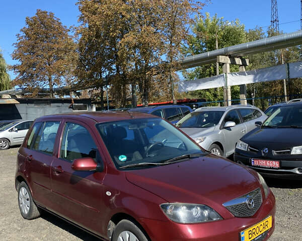 Красный Мазда 2, объемом двигателя 1.39 л и пробегом 310 тыс. км за 3900 $, фото 2 на Automoto.ua