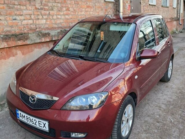Красный Мазда 2, объемом двигателя 1.4 л и пробегом 131 тыс. км за 4900 $, фото 1 на Automoto.ua