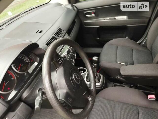 Красный Мазда 2, объемом двигателя 1.39 л и пробегом 153 тыс. км за 3599 $, фото 10 на Automoto.ua