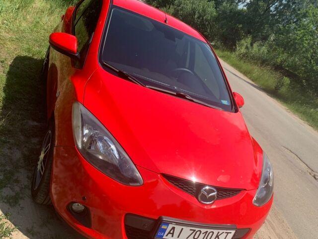 Червоний Мазда 2, об'ємом двигуна 1 л та пробігом 292 тис. км за 6450 $, фото 3 на Automoto.ua