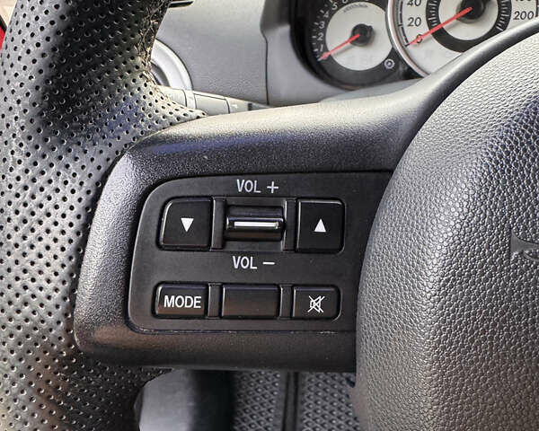 Червоний Мазда 2, об'ємом двигуна 1.5 л та пробігом 138 тис. км за 6800 $, фото 20 на Automoto.ua